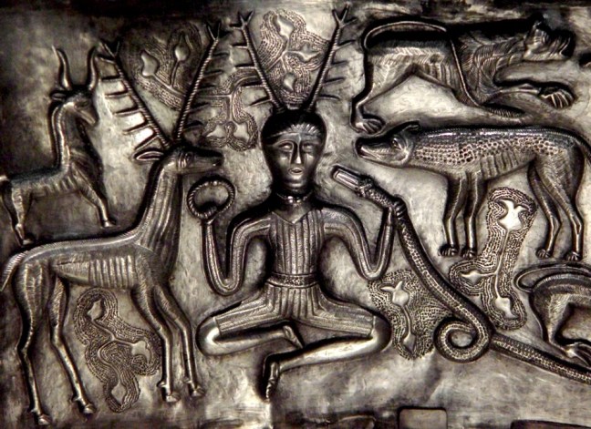 the-antlered-deity-of-the-gundestrup-cauldron-commonly-identified-with-cernunnos-holding-a-ram-horned-serpent-and-a-torc